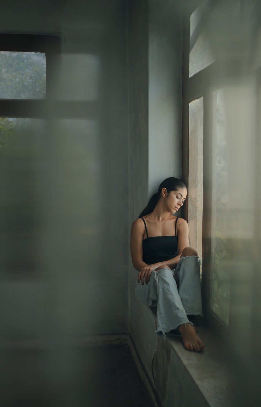 Quiet figure in warm light, showing who AEDP therapy is for