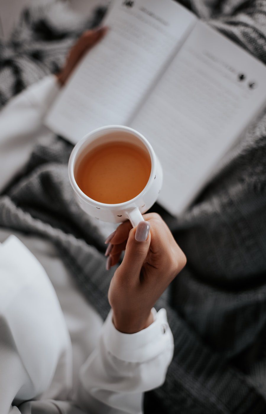 Asian woman by a window, psychodynamic therapy for Chinese and Asian American adults